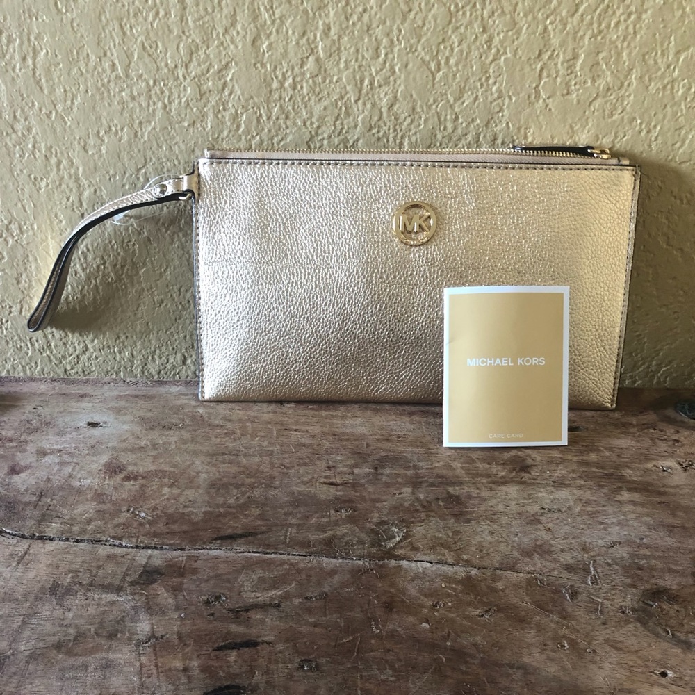 Michael Kors Gold Wristlet- never used!